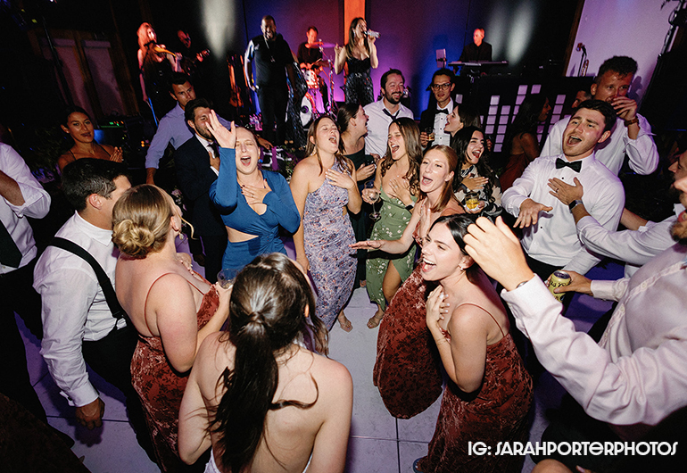 Bride and her friends dancing and singing along with The Radio Band